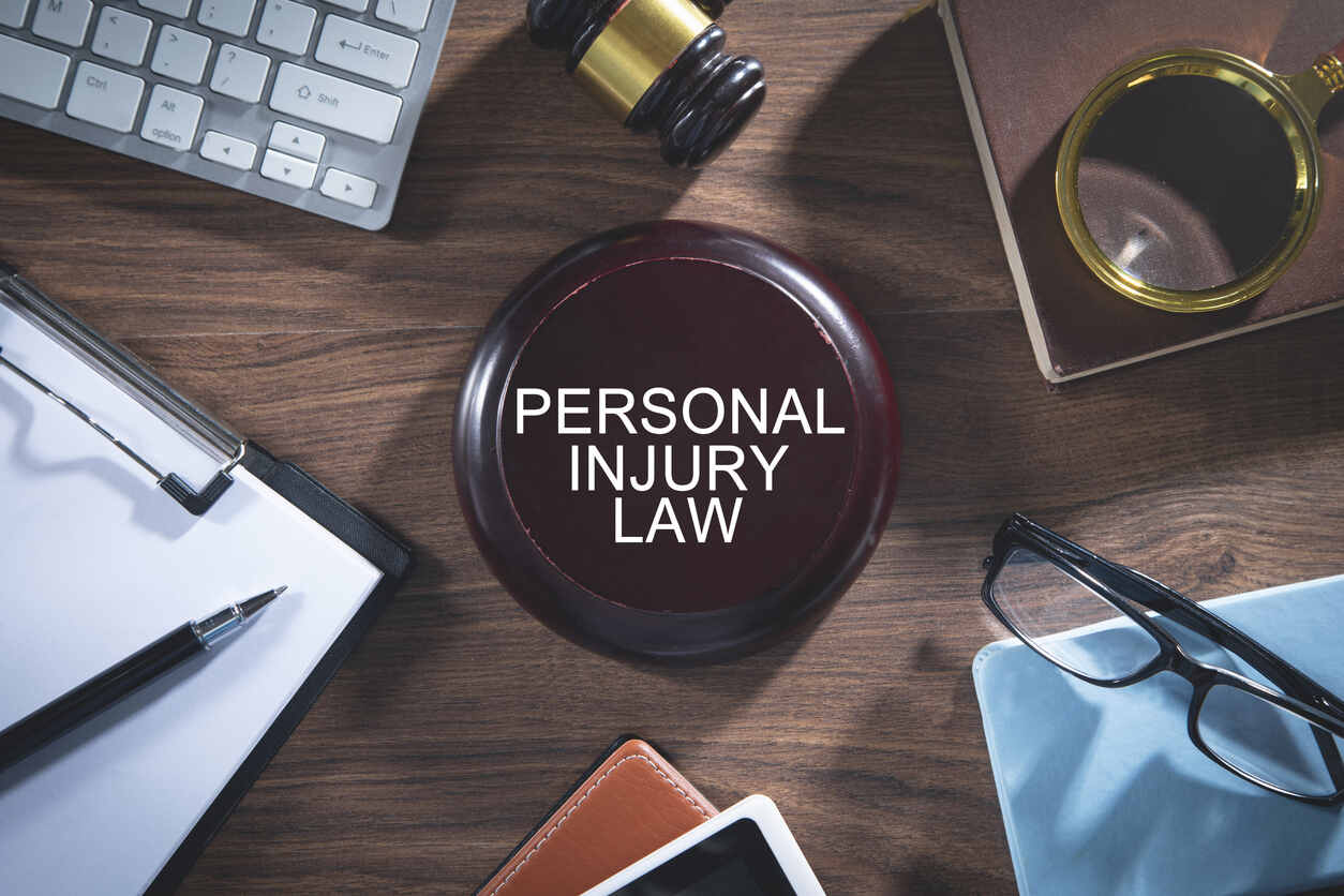 Persnal injury law Gavel on the with paper, pen, and persnal injury law board
