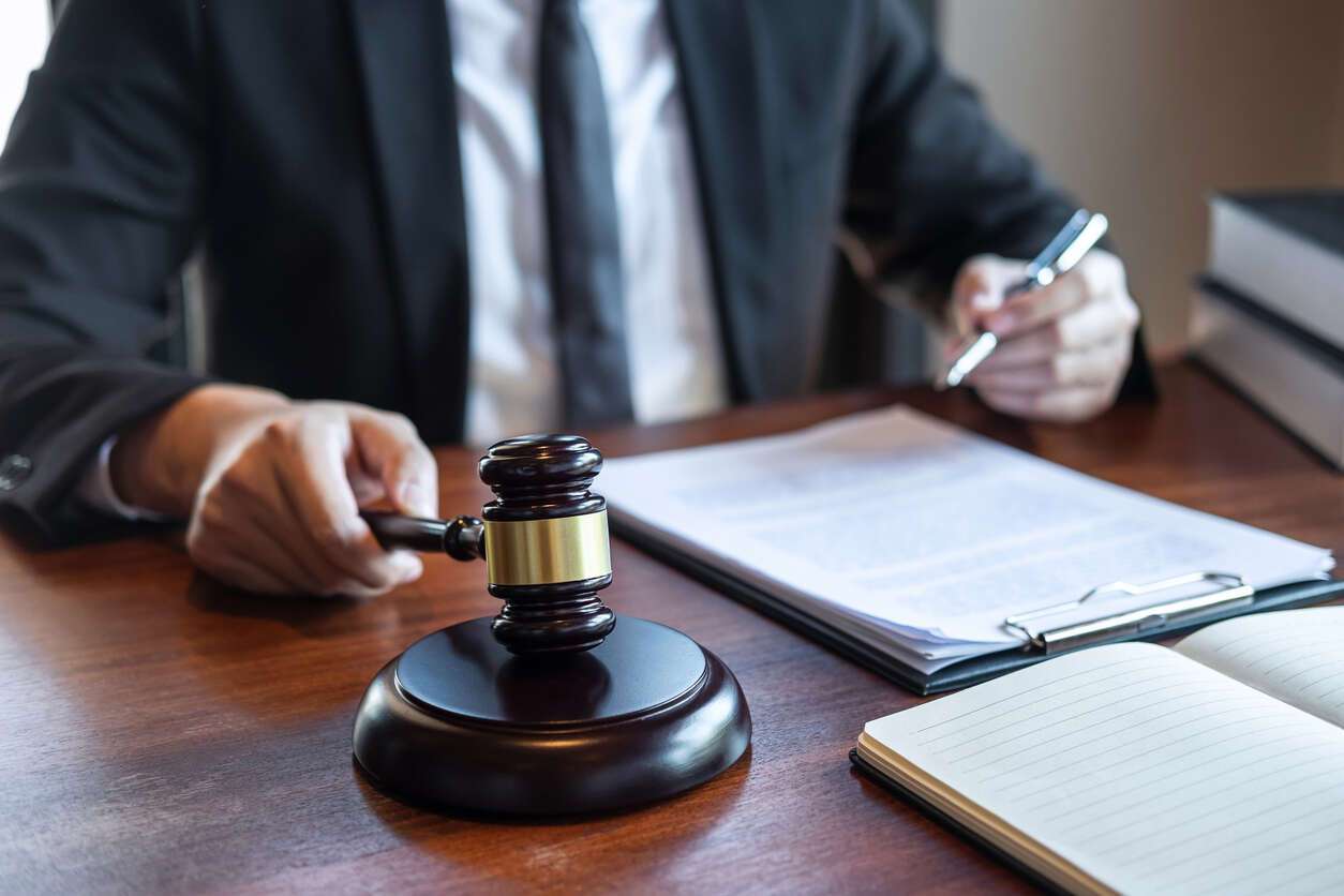 Glendale personal injury lawyer personal injury lawyer holding gavel and working on the inury claim process